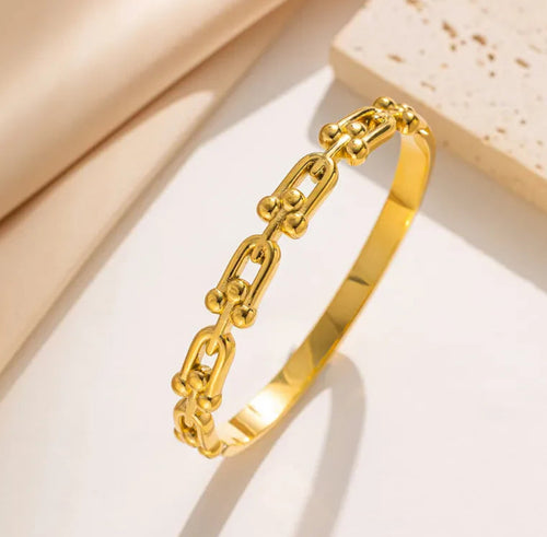 Rhea Buckle Gold Bangle